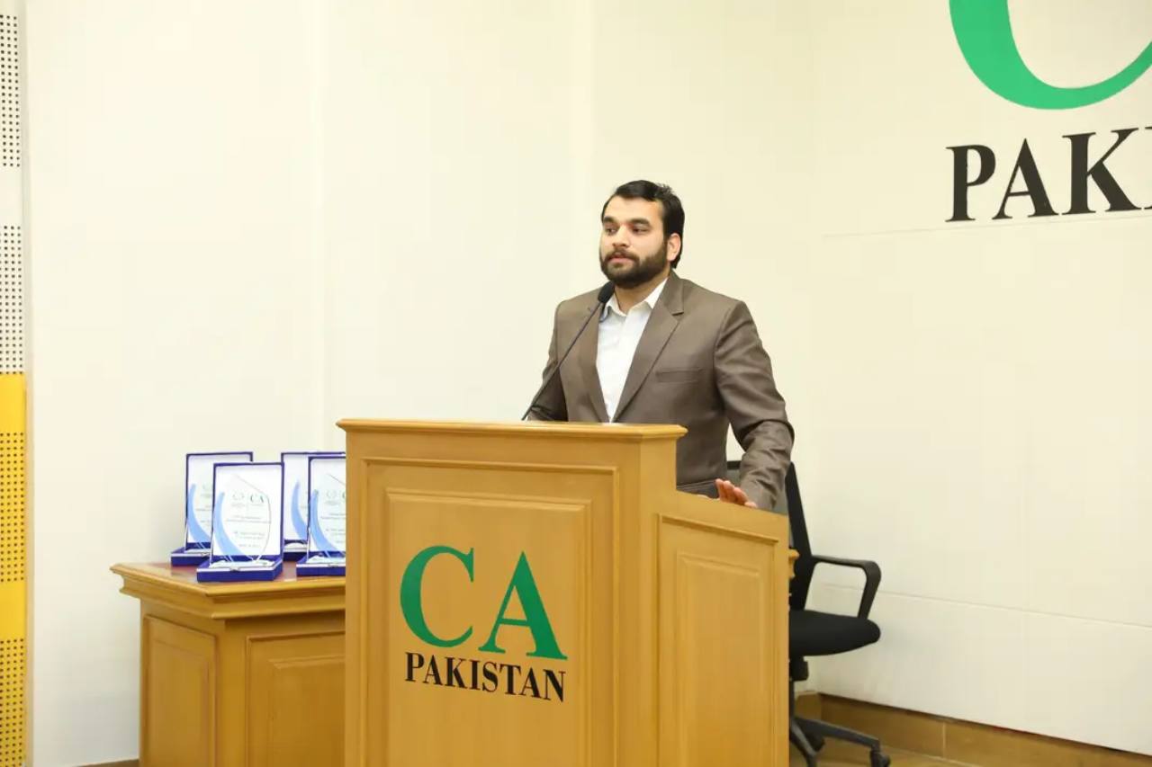 Zeshan Saif speaking at a Chartered Accountancy professional conference
