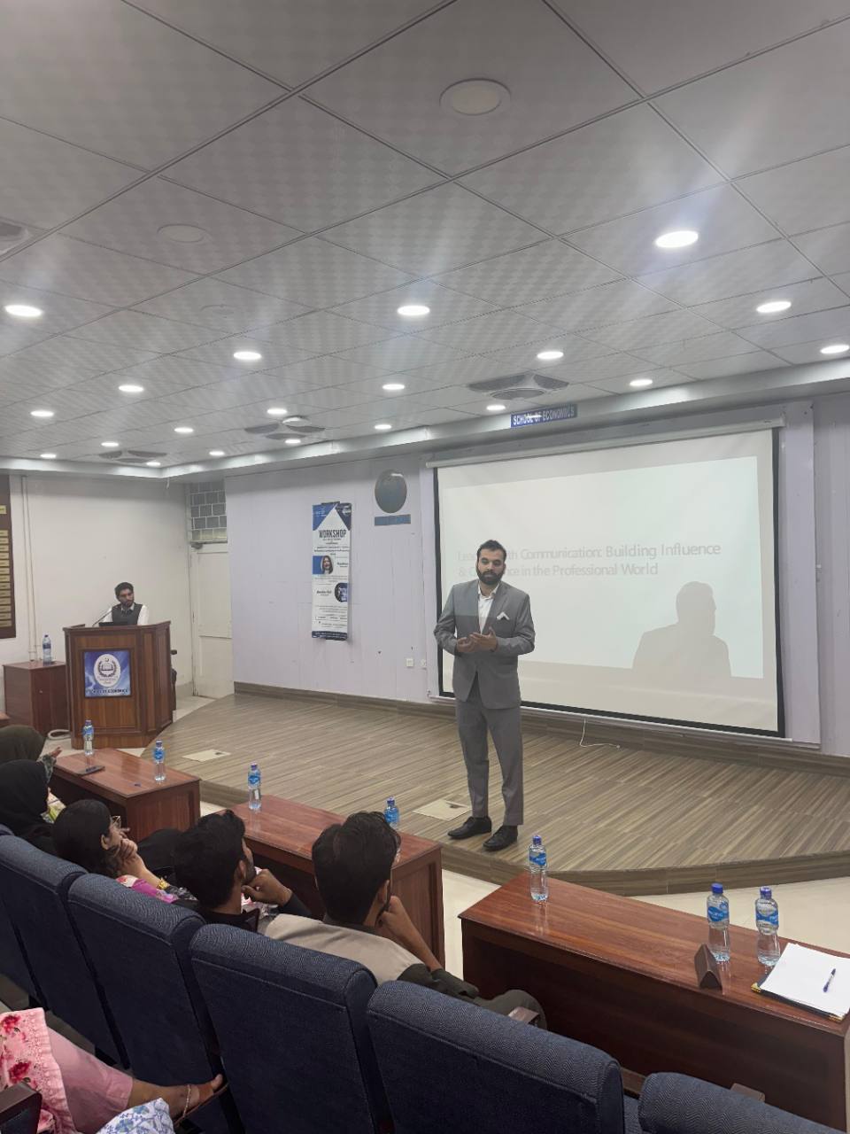 Zeshan Saif delivering a professional communication workshop to an audience